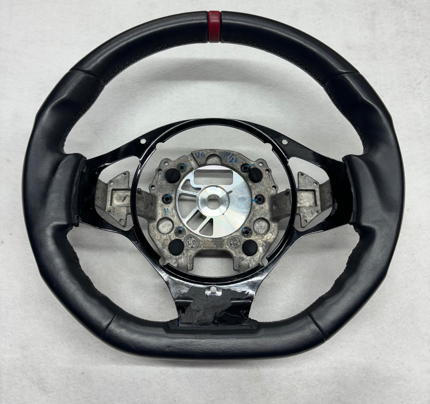 A132V0378F Evora Steering Wheel Black Leather With Red Stripe