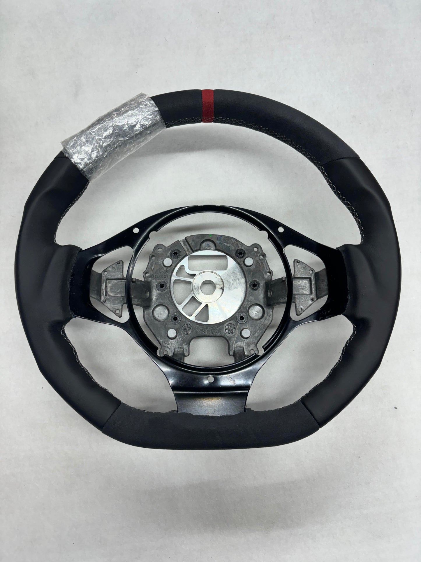 A132v1693F-002 Steering Wheel Black Leather With Red Stripe