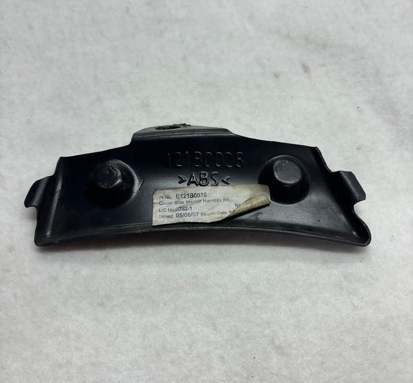 B121B0028F Cover Side Marker Harness Rear LH